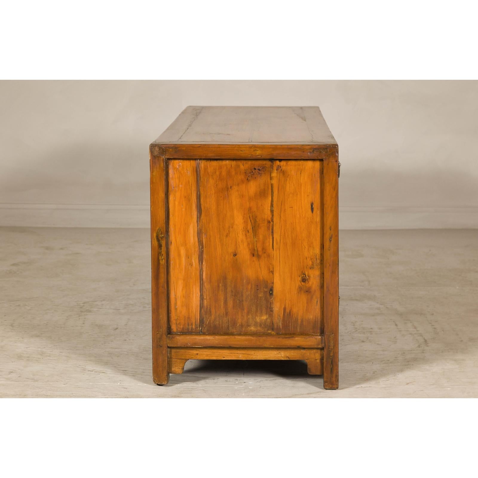 Late Qing Dynasty Elm Sideboard with Carved Floral Vases, Doors and Drawers