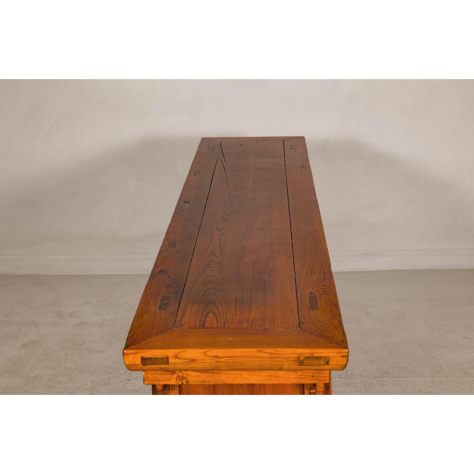 Qing Dynasty Elm Sideboard in Honey Lacquer with Four Doors and Brass Hardware