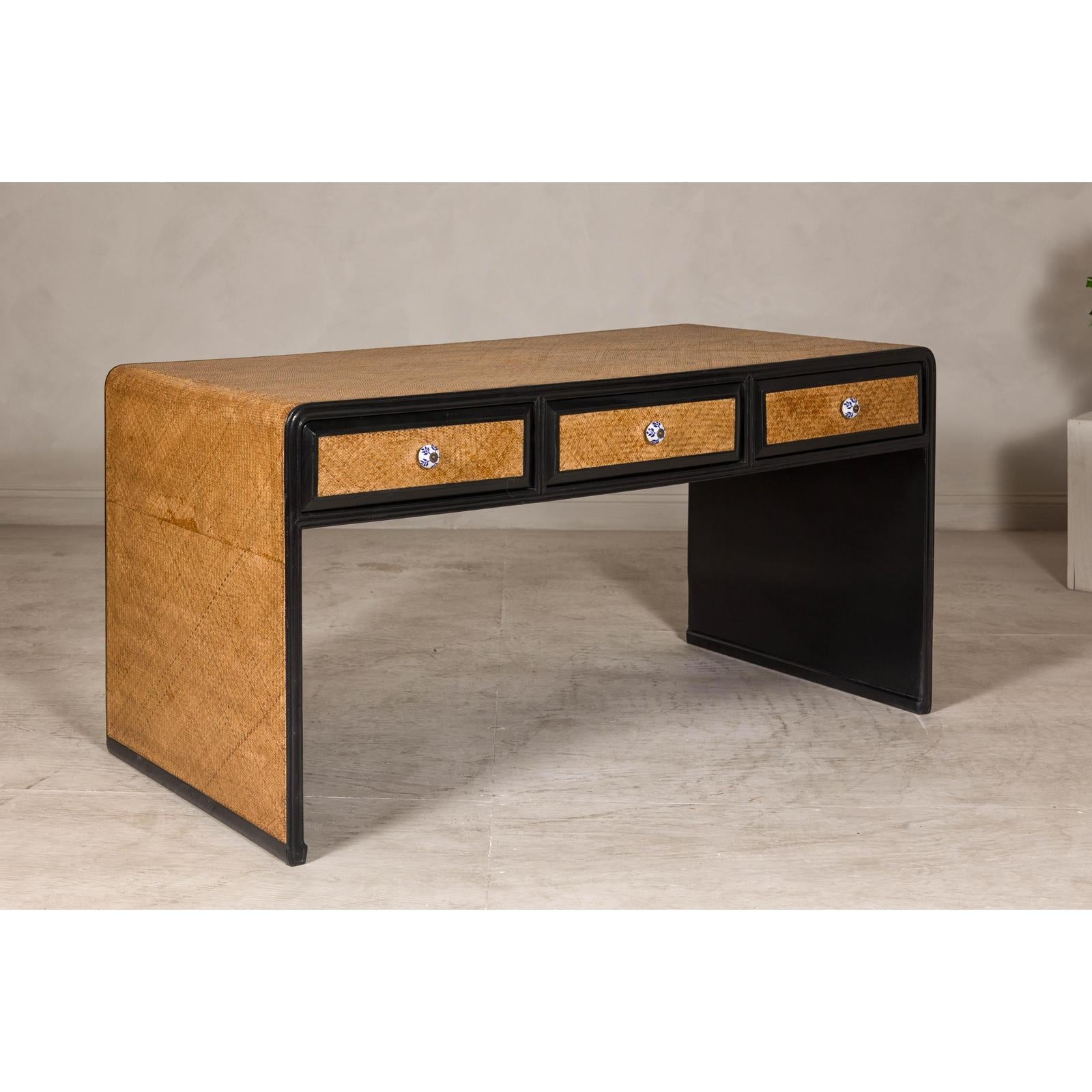 Rattan over Wood Waterfall Desk with Black Lacquer Finish and Three Drawers