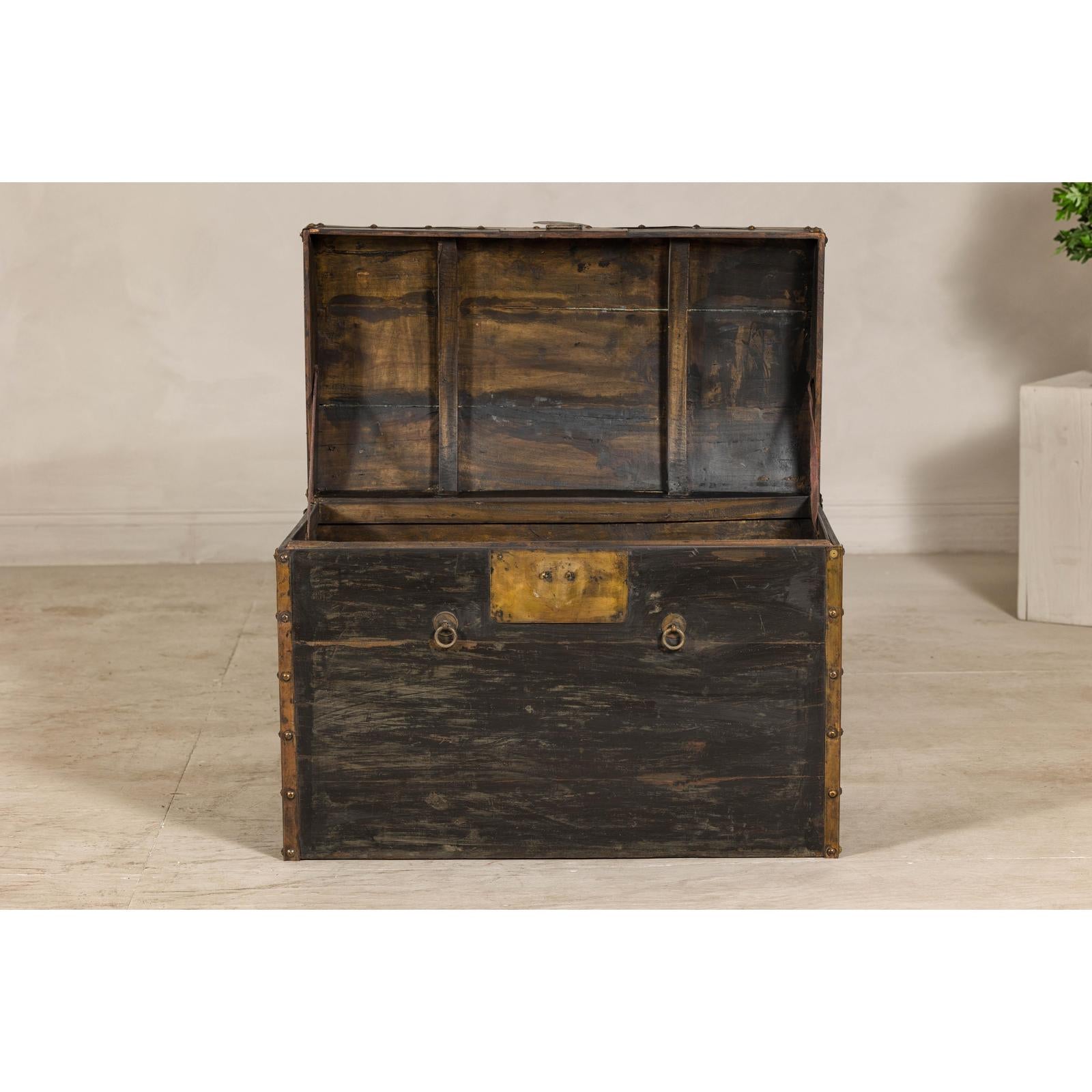 Antique Black and Gold Late Qing Dynasty Trunk with Curved Top and Brass Accents