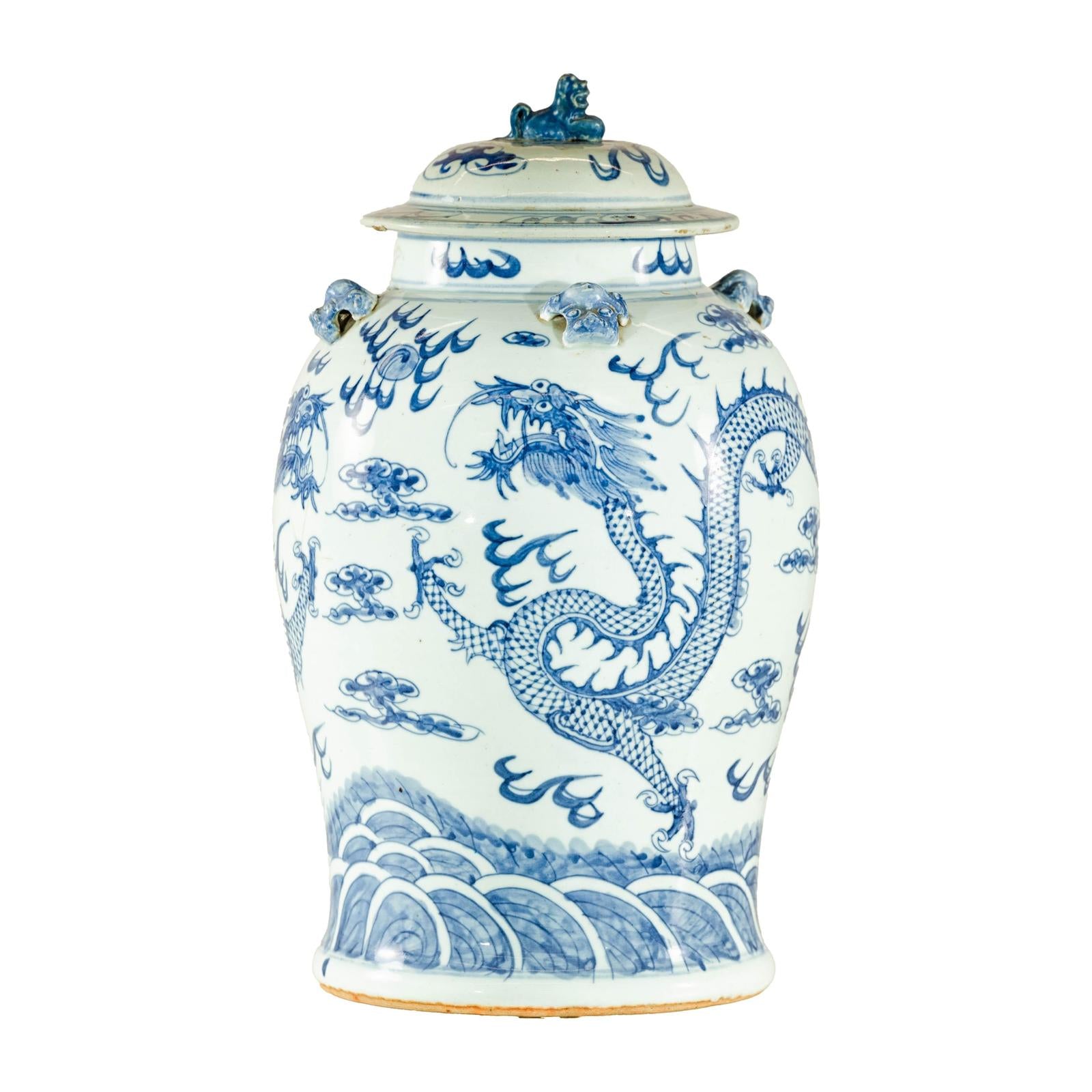Qing Dynasty Blue and White Porcelain Dragon Jar with Lid and Foo Dog Finial