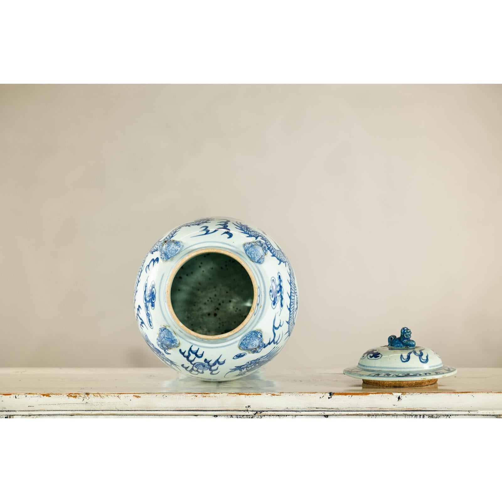 Qing Dynasty Blue and White Porcelain Dragon Jar with Lid and Foo Dog Finial