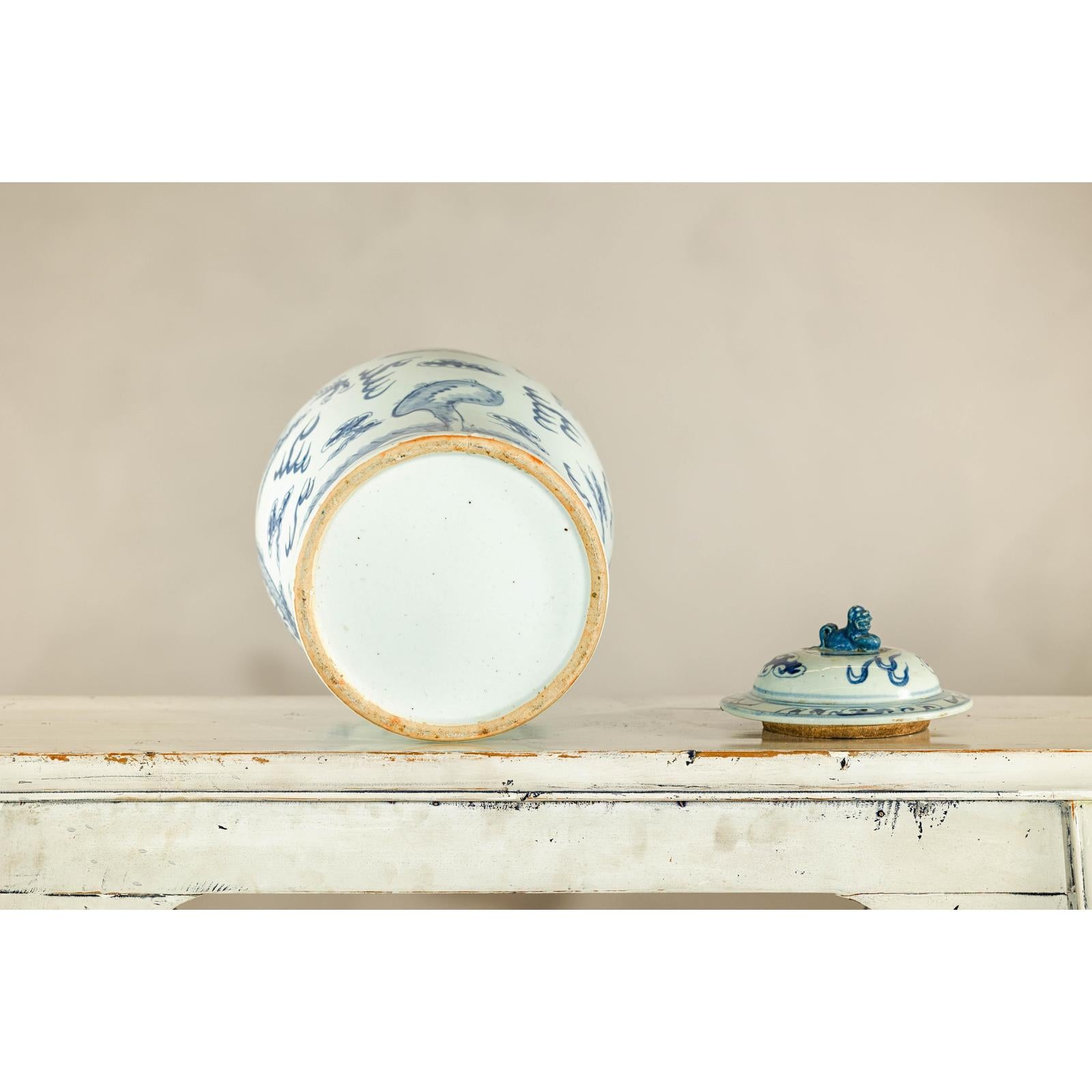Qing Dynasty Blue and White Porcelain Dragon Jar with Lid and Foo Dog Finial