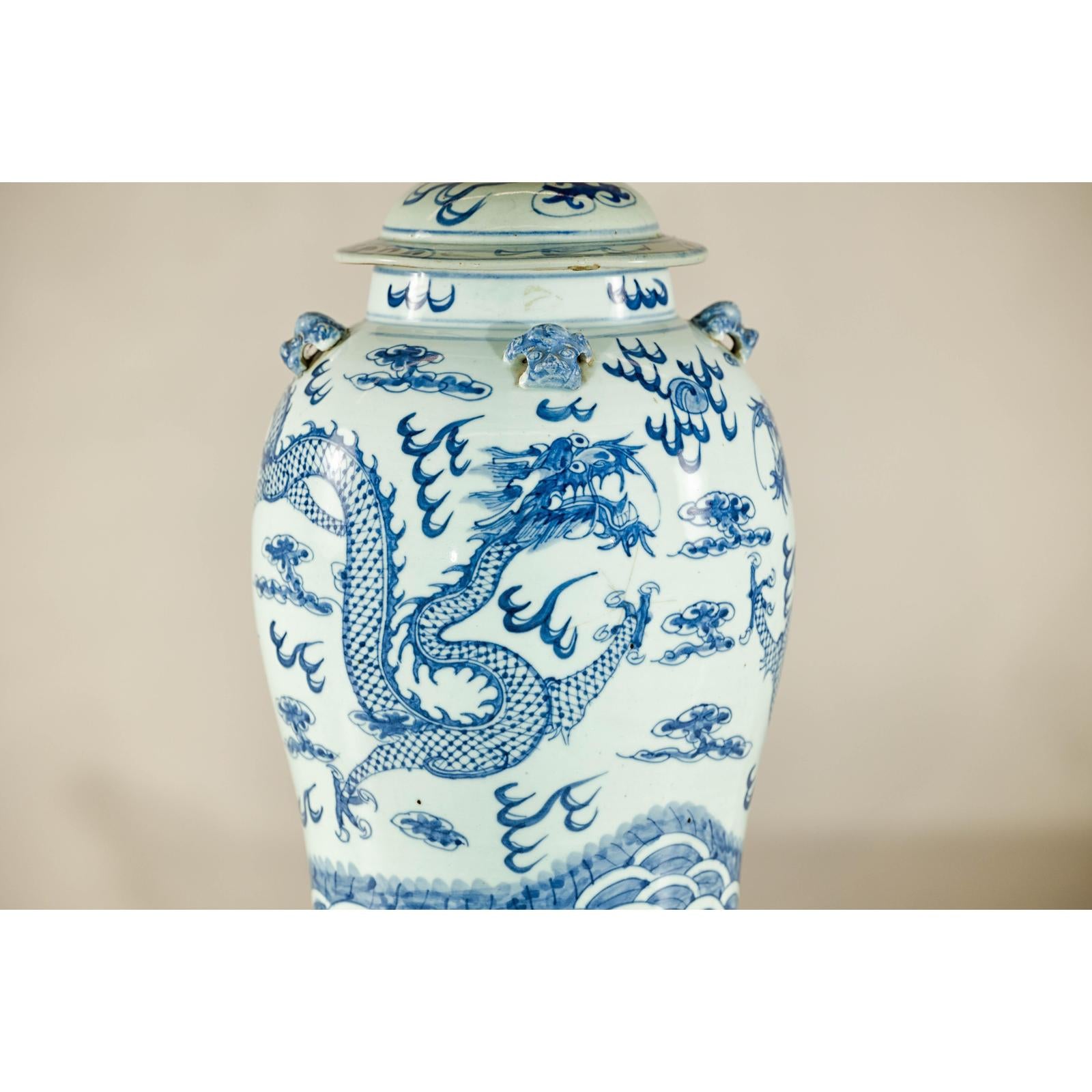Qing Dynasty Blue and White Porcelain Dragon Jar with Lid and Foo Dog Finial