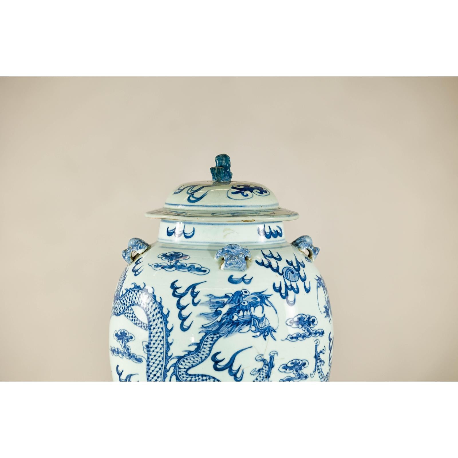 Qing Dynasty Blue and White Porcelain Dragon Jar with Lid and Foo Dog Finial