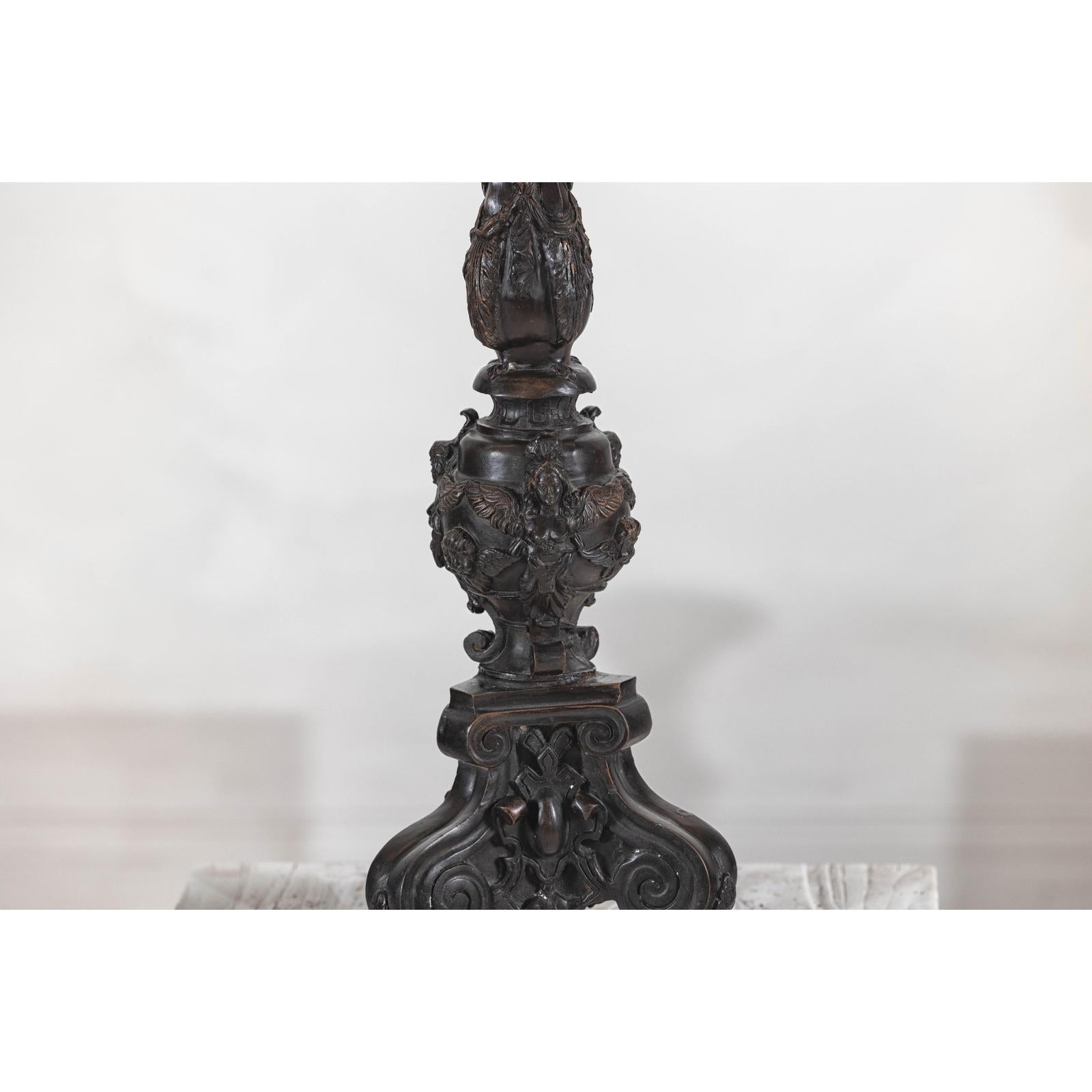 Baroque-Style Ornate Metal Candlesticks with Cherub, Volute and Garland Motifs