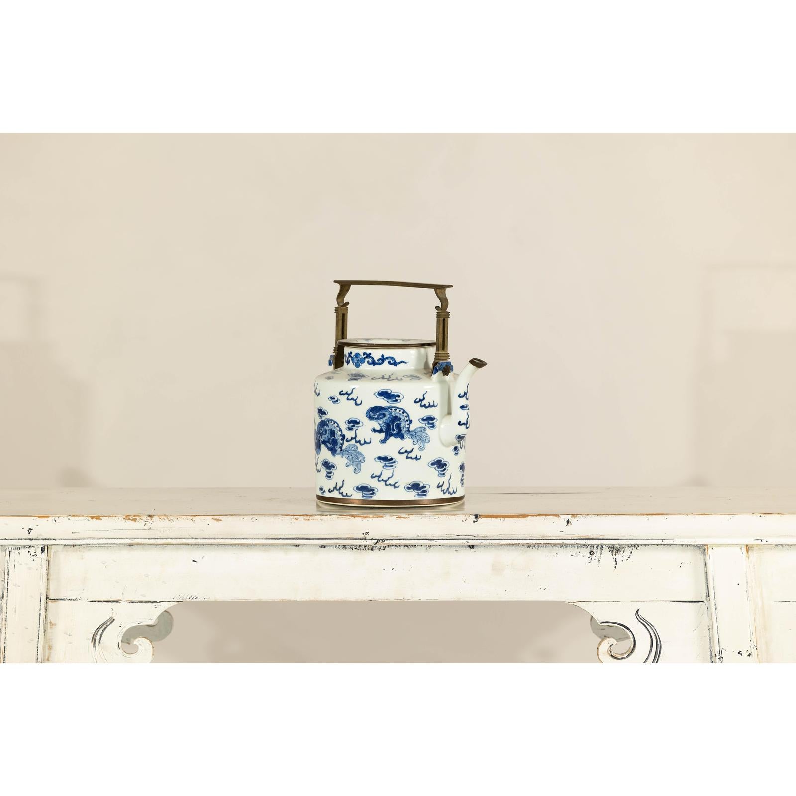 Blue and White Porcelain Teapot with Mythical Qilin and Auspicious Cloud Motifs