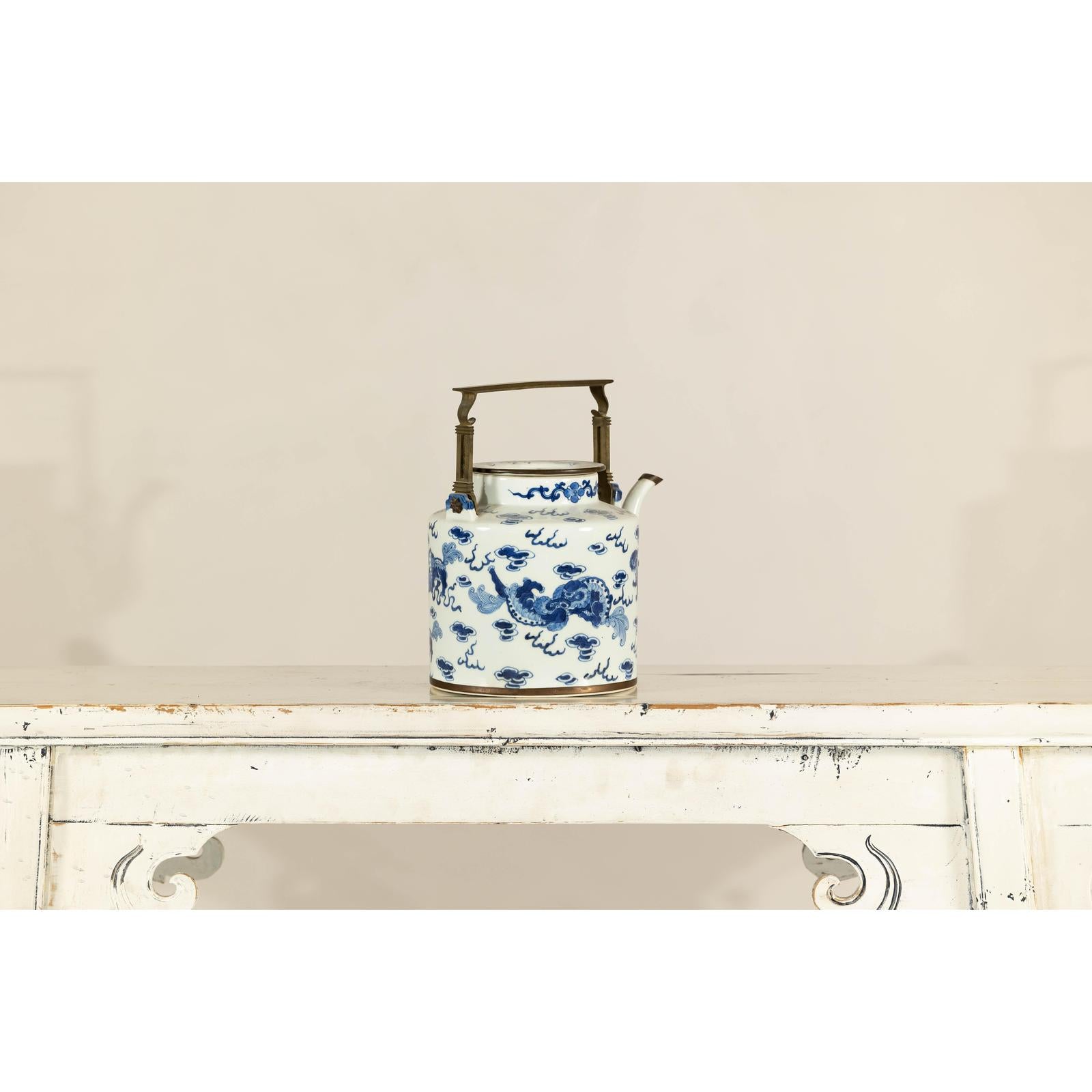 Blue and White Porcelain Teapot with Mythical Qilin and Auspicious Cloud Motifs