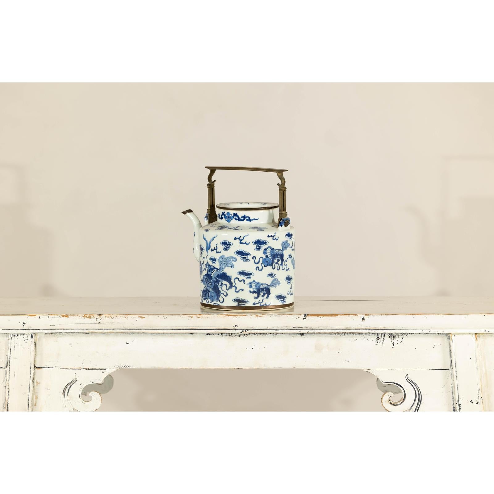 Blue and White Porcelain Teapot with Mythical Qilin and Auspicious Cloud Motifs
