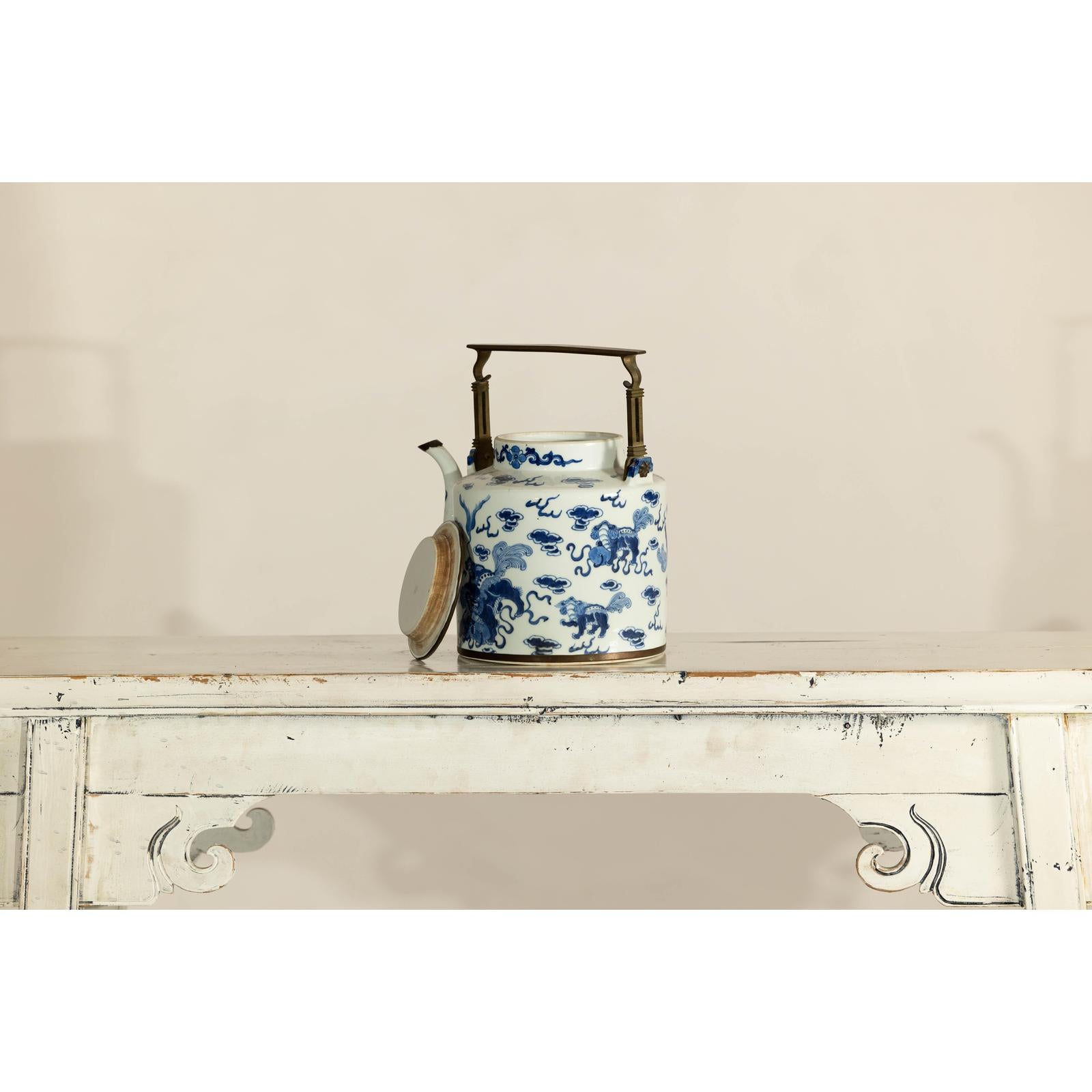 Blue and White Porcelain Teapot with Mythical Qilin and Auspicious Cloud Motifs