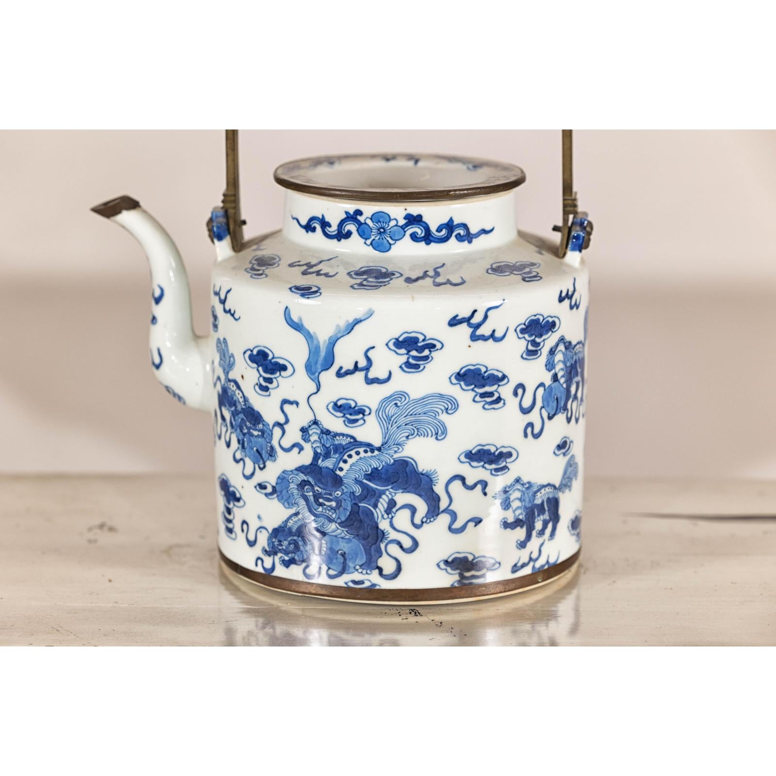 Blue and White Porcelain Teapot with Mythical Qilin and Auspicious Cloud Motifs