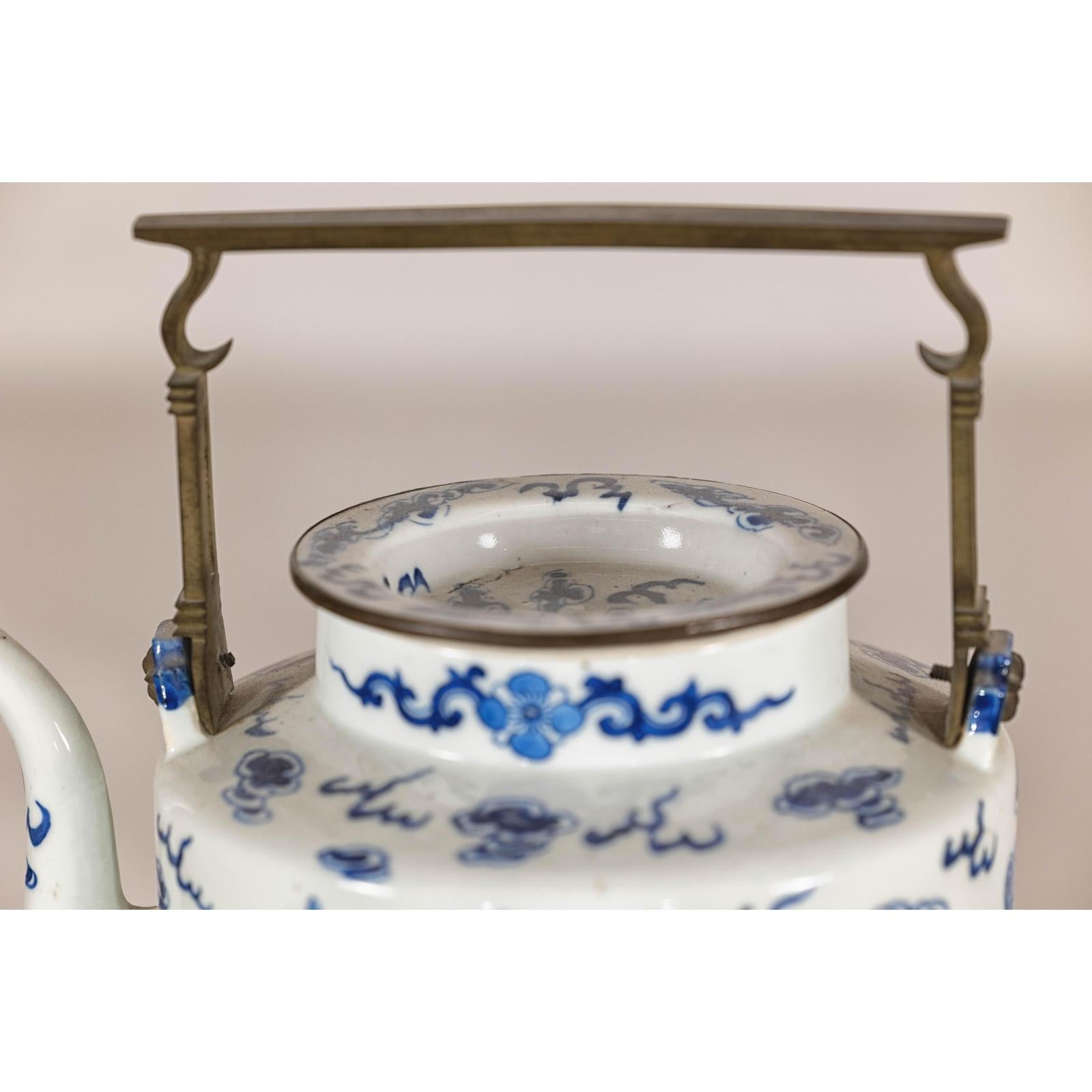 Blue and White Porcelain Teapot with Mythical Qilin and Auspicious Cloud Motifs