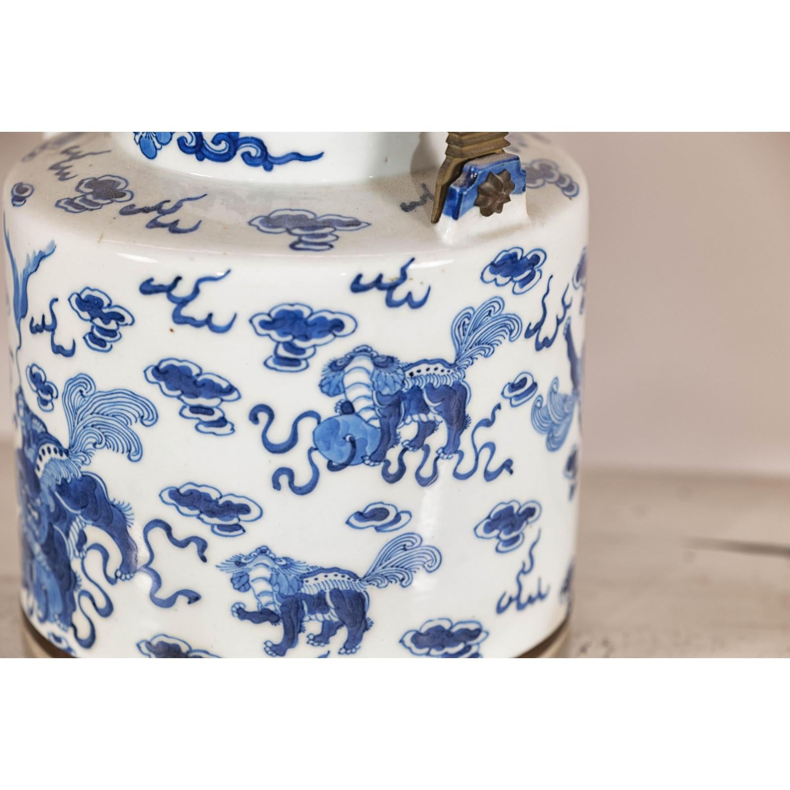 Blue and White Porcelain Teapot with Mythical Qilin and Auspicious Cloud Motifs