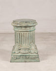 Verdigris bronze pedestal, distant front view
