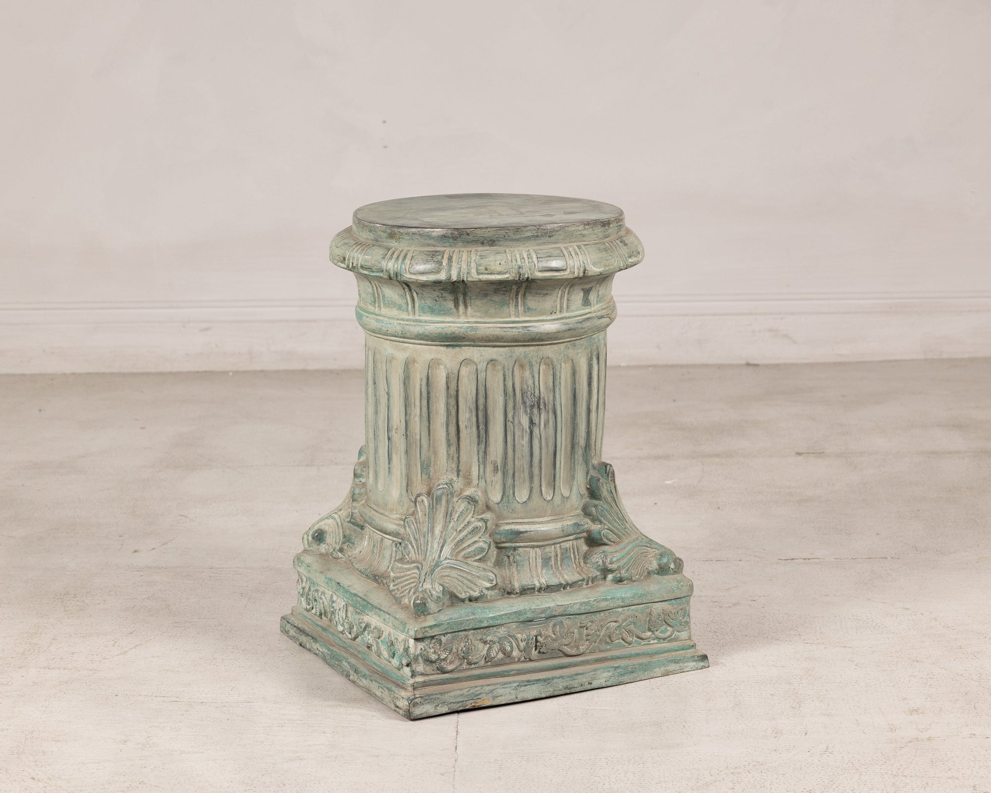 Verdigris bronze pedestal, three-quarter left view