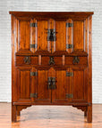 Wooden cabinet with multiple doors on a white background