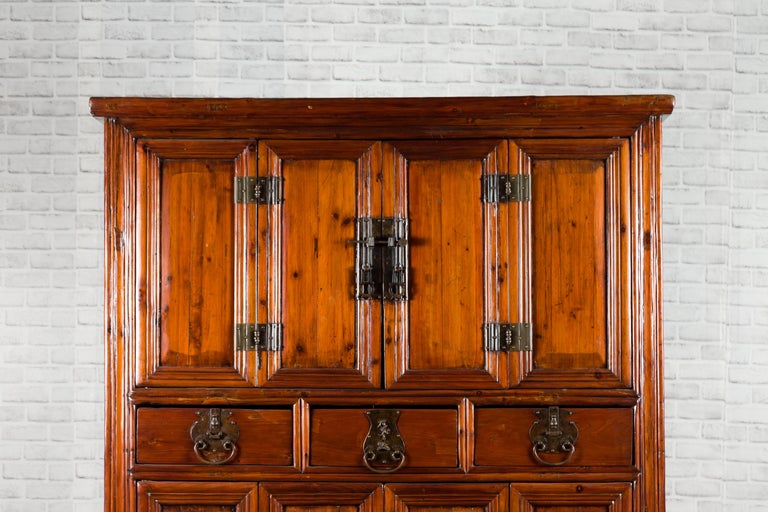 Wooden cabinet with multiple doors on a white background