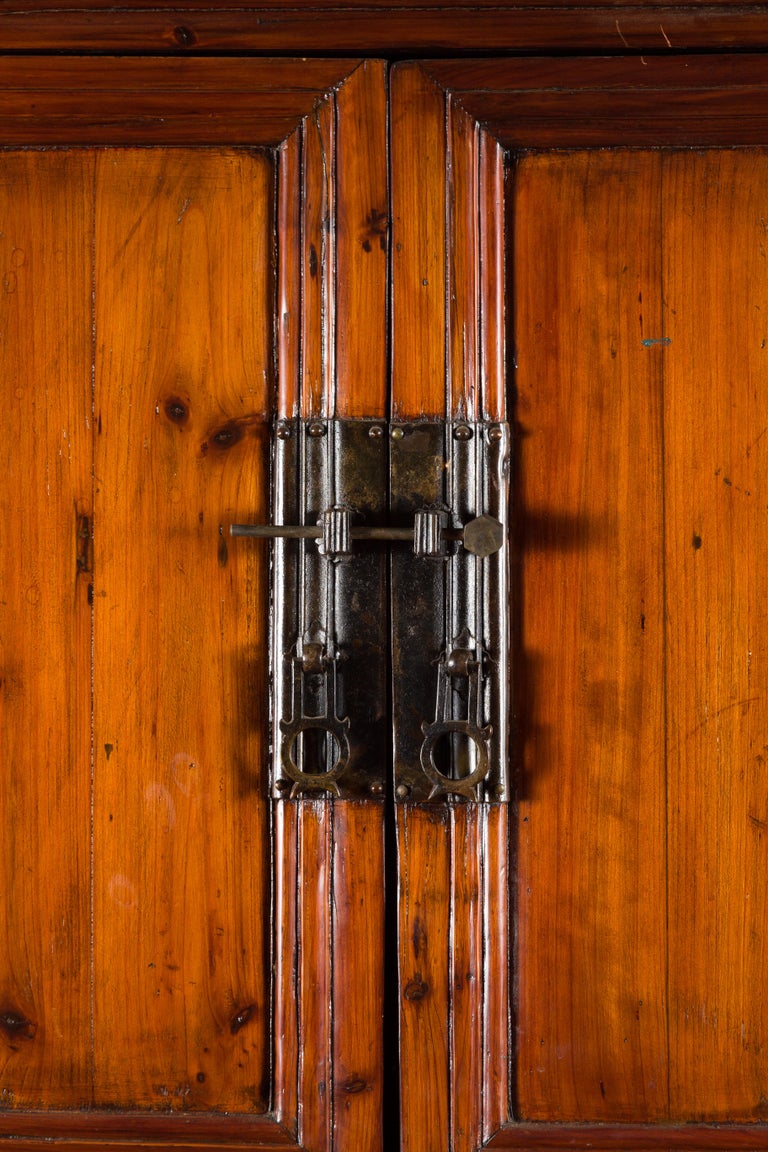 Wooden cabinet with multiple doors on a white background