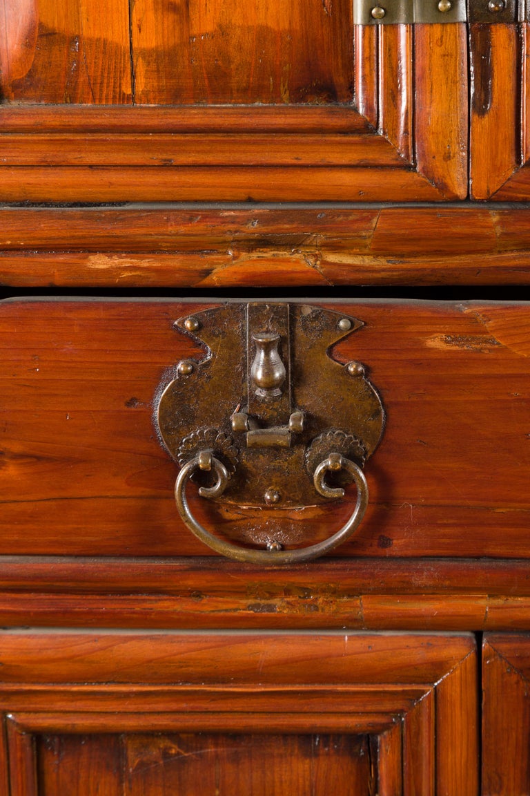 Wooden cabinet with multiple doors on a white background