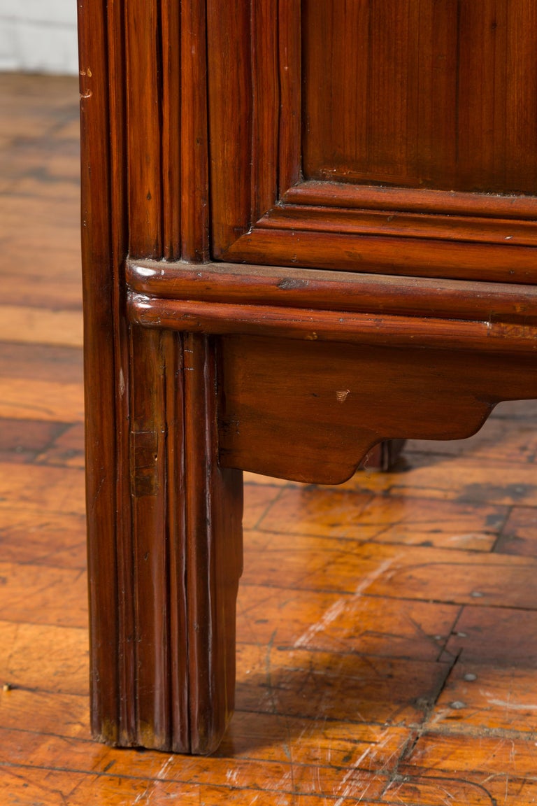 Wooden cabinet with multiple doors on a white background