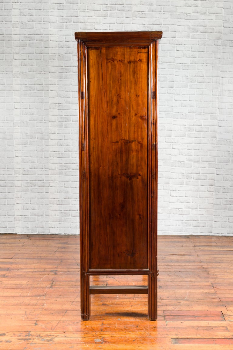 Wooden cabinet with multiple doors on a white background