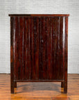 Wooden cabinet with multiple doors on a white background