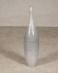 Gray-glazed ceramic bottle vase with horizontal spiral incising.