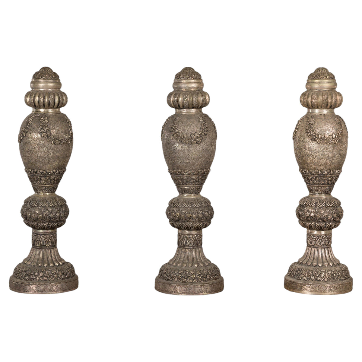 Set of Three Vintage Indian Silver-Plated Embossed Vessels, full object on a white background