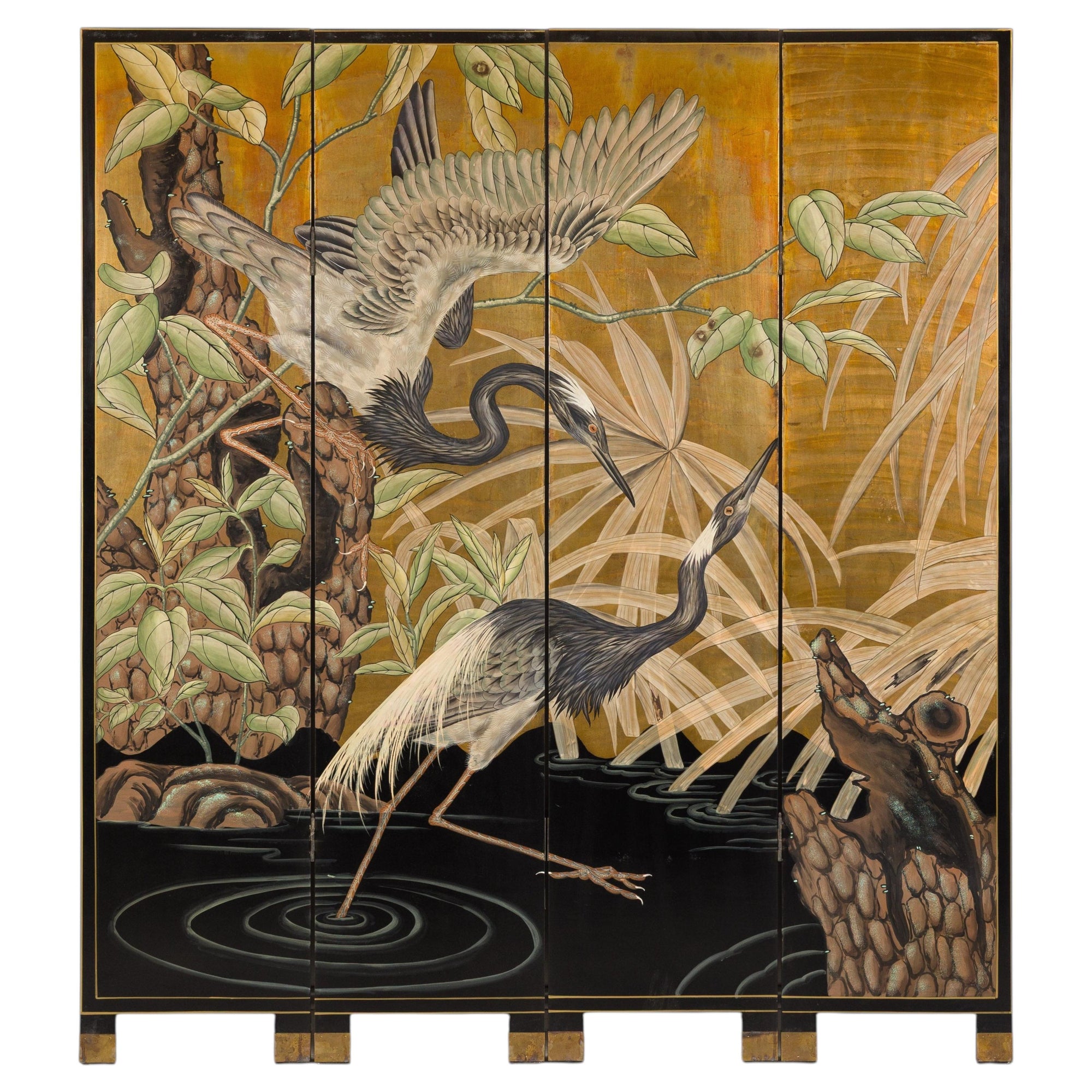 Gold-tone painted wood four-panel Chinese screen with cranes, plants, and rocks on decorative surface.