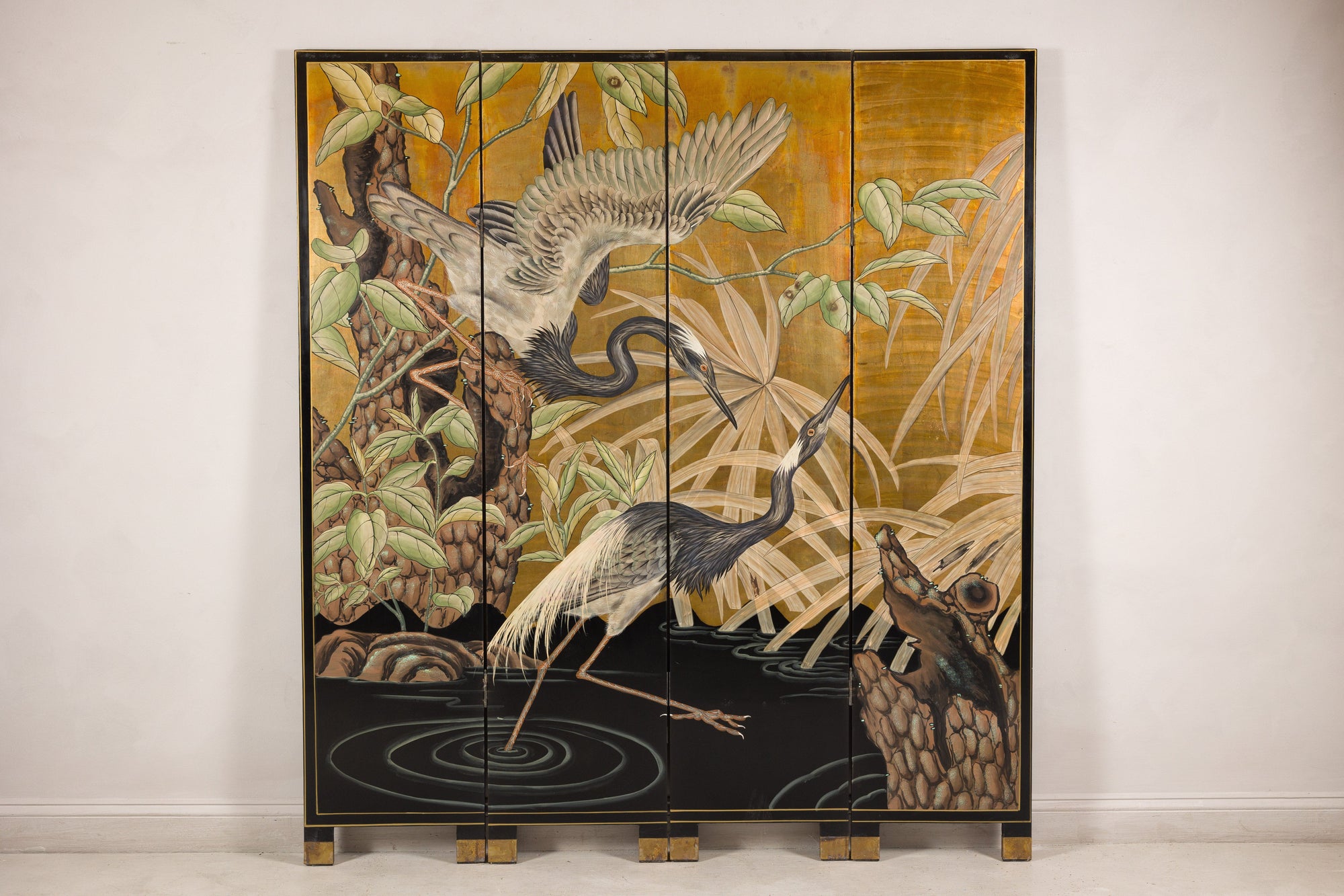 Gold-tone painted wood four-panel Chinese screen featuring cranes in traditional style, full front view.