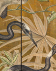 Close-up of painted cranes and foliage on gold-tone panels