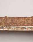 Gilt and red carved wood architectural panel angled view