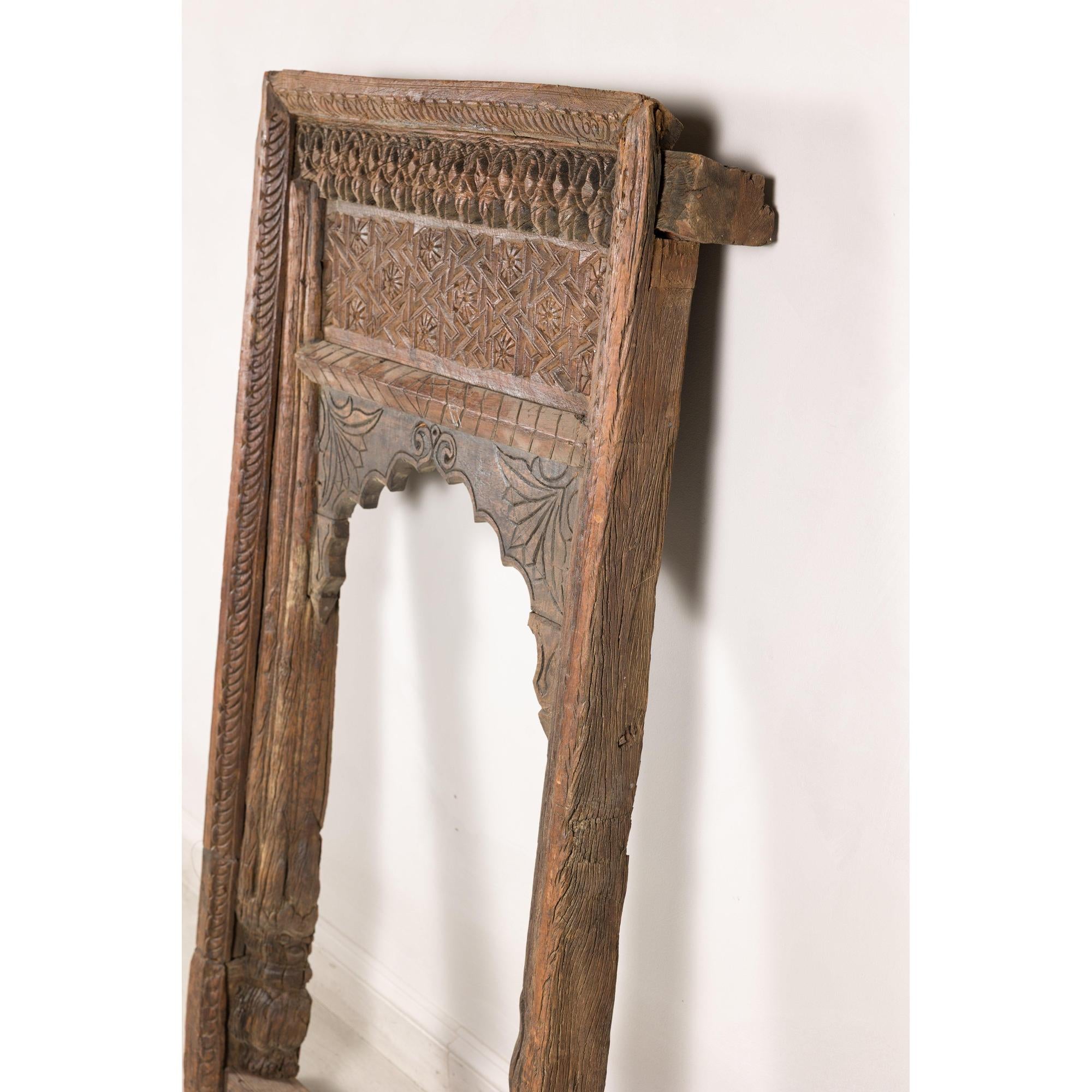 Antique Indian carved architectural frame, angled right view