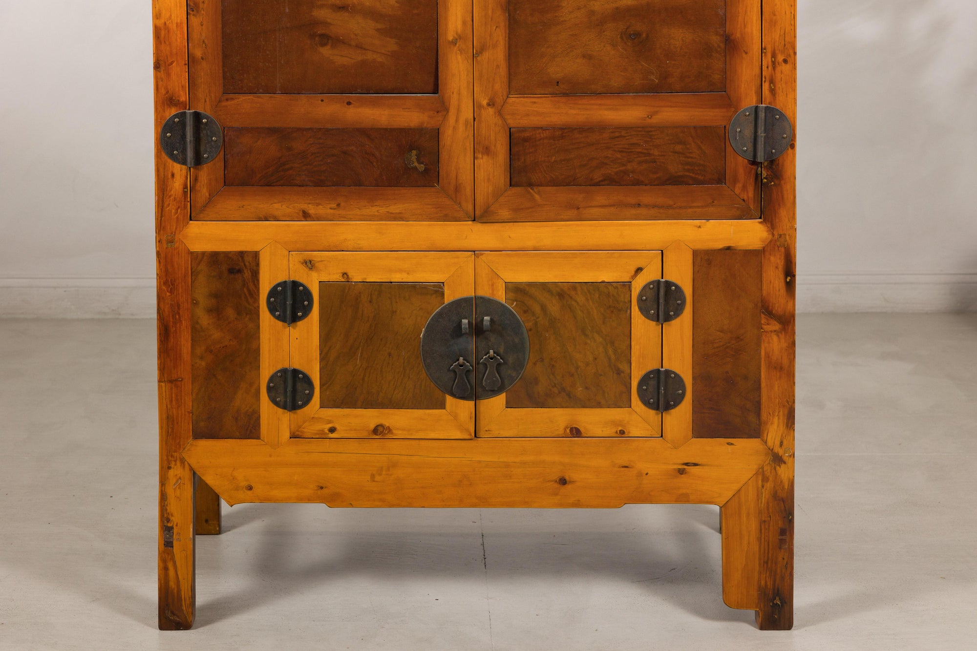 Chinese elm and burl wood cabinet surface detail