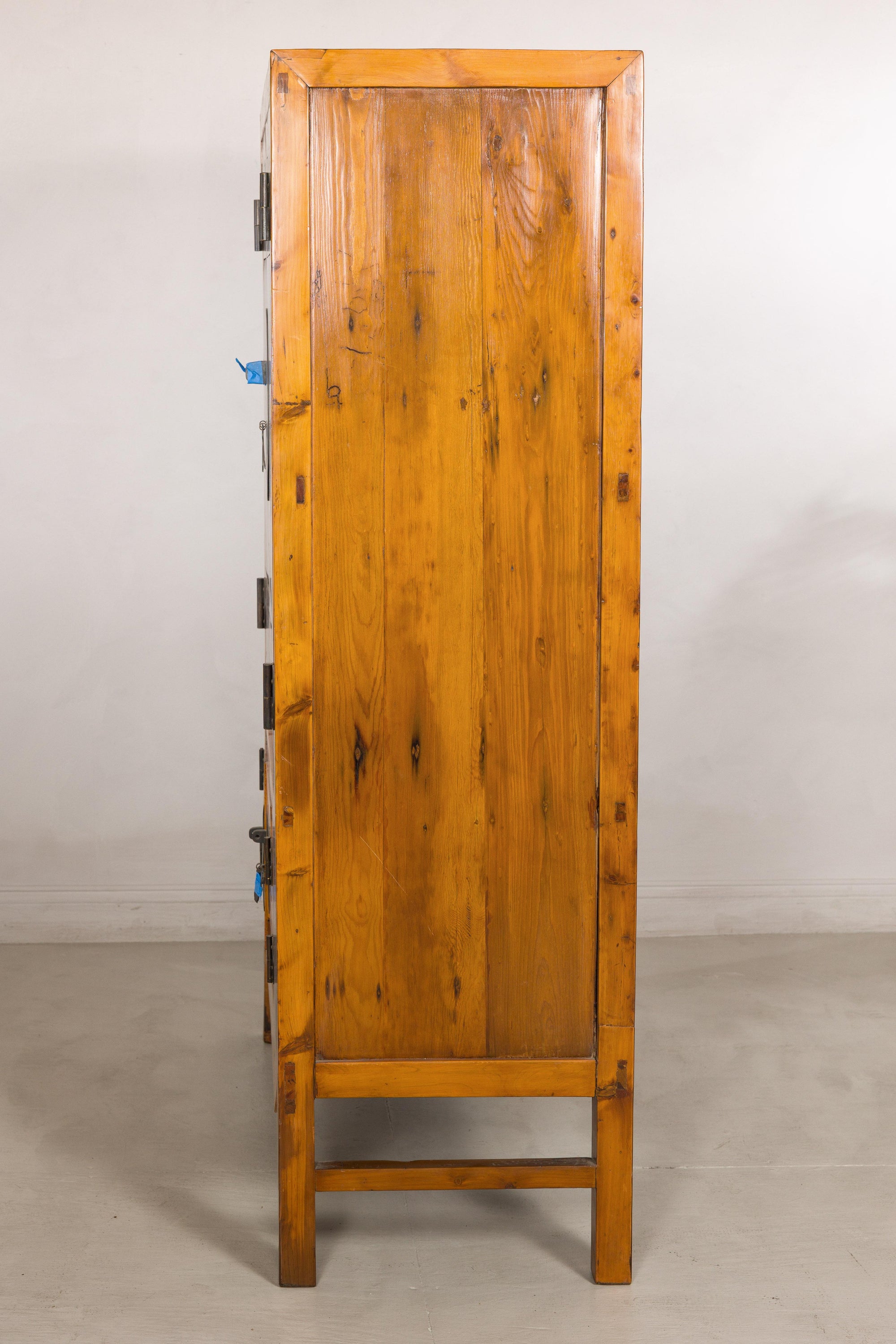 Chinese elm and burl wood cabinet interior view