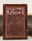 Reverse of carved Chinese panel showing open latticework