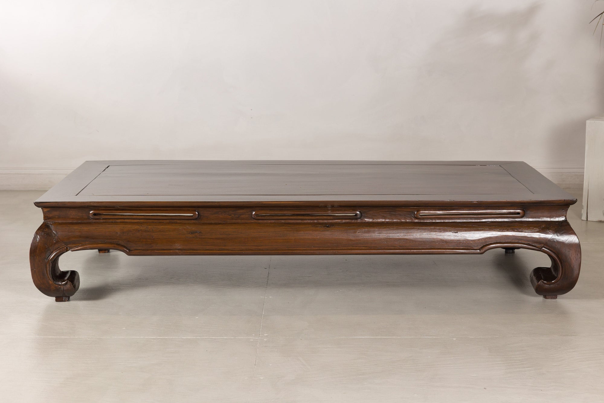 Alternate side view of the kang table with curved scroll feet