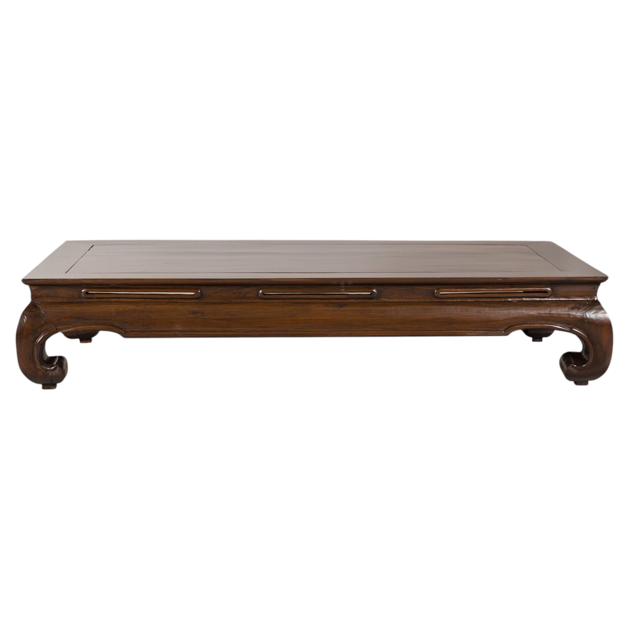Low Chinese elm kang coffee table with scroll feet on a white background