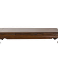 Low Chinese elm kang coffee table with scroll feet on a white background