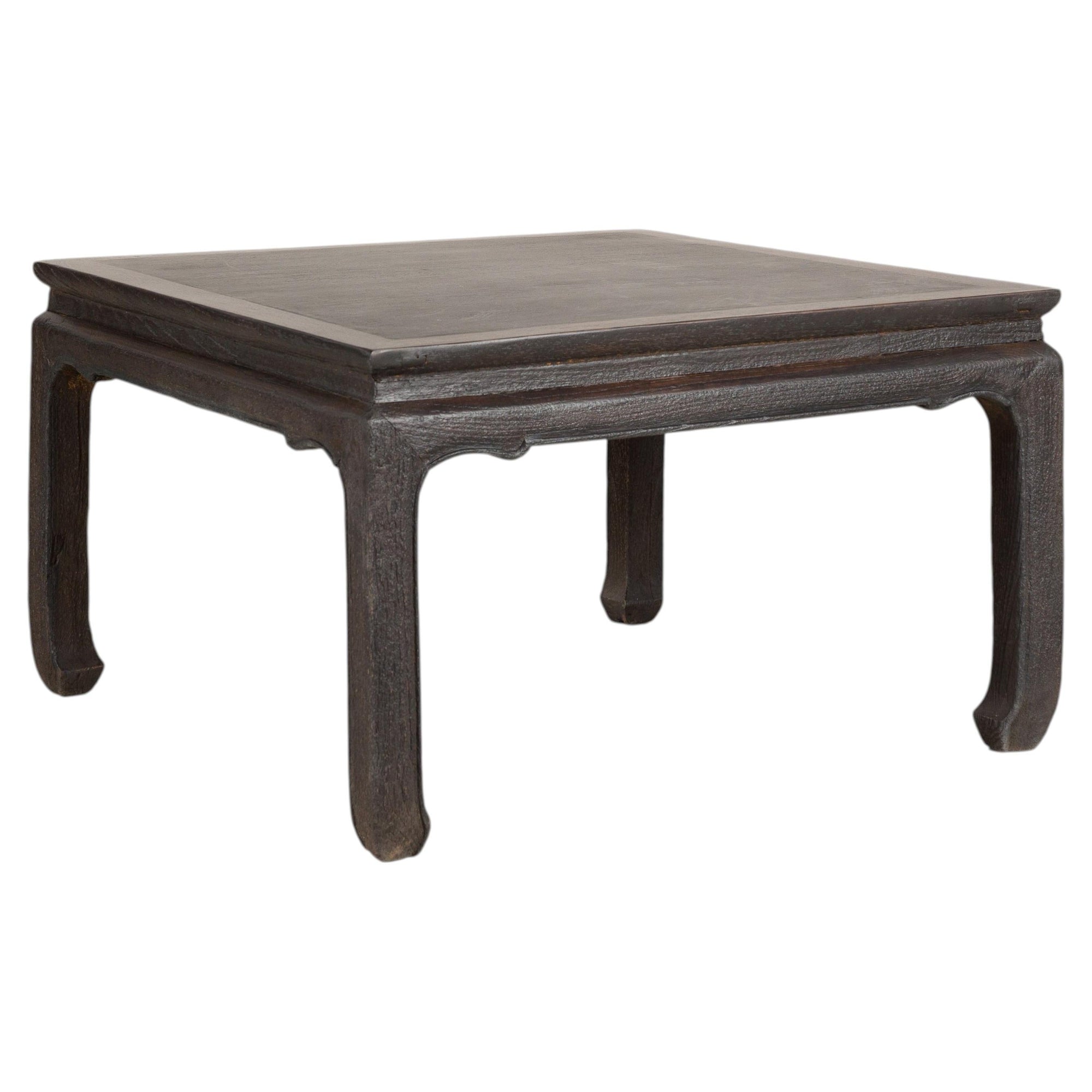 Chinese hardwood and dark stone coffee table on white background
