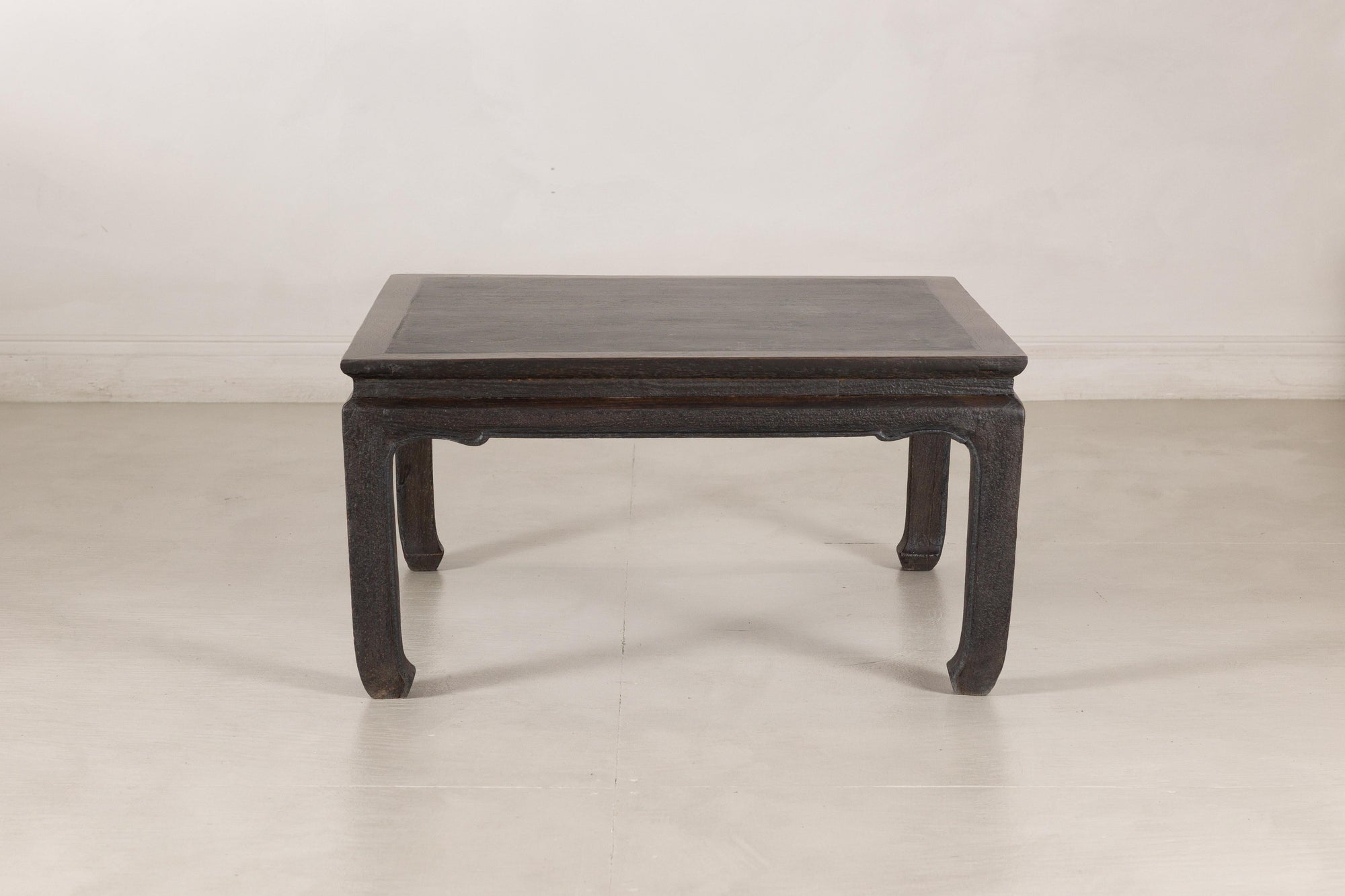 Chinese hardwood and dark stone coffee table angled view