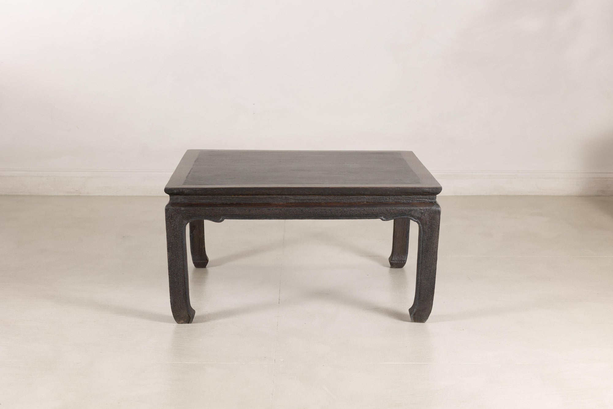 Chinese hardwood and dark stone coffee table side view
