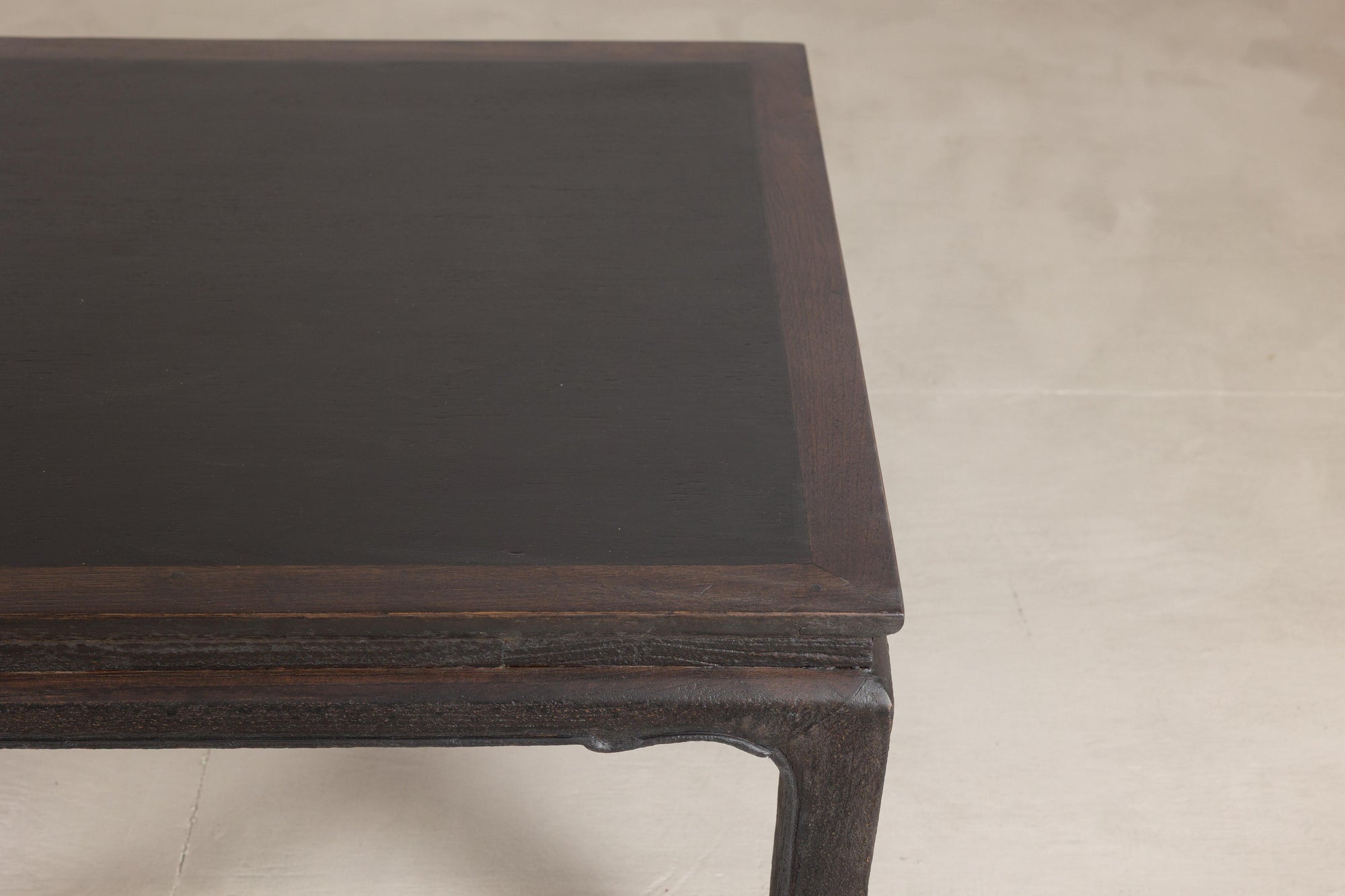 Chinese hardwood and dark stone coffee table surface detail