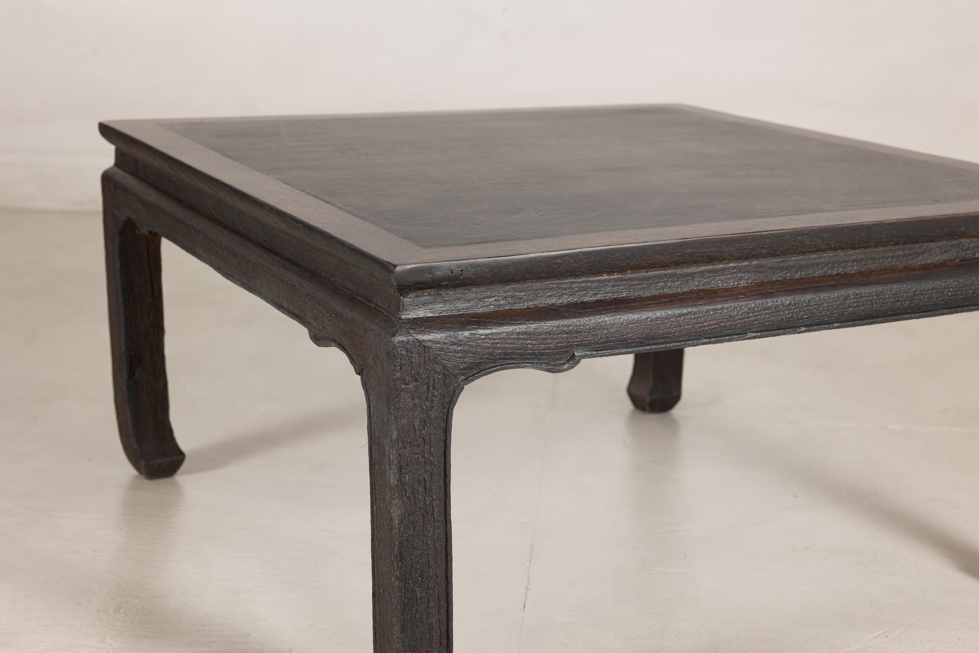 Chinese hardwood and dark stone coffee table close-up detail