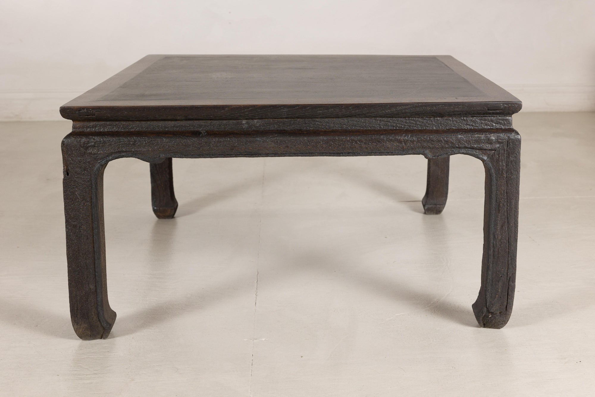 Chinese hardwood and dark stone coffee table hardware detail