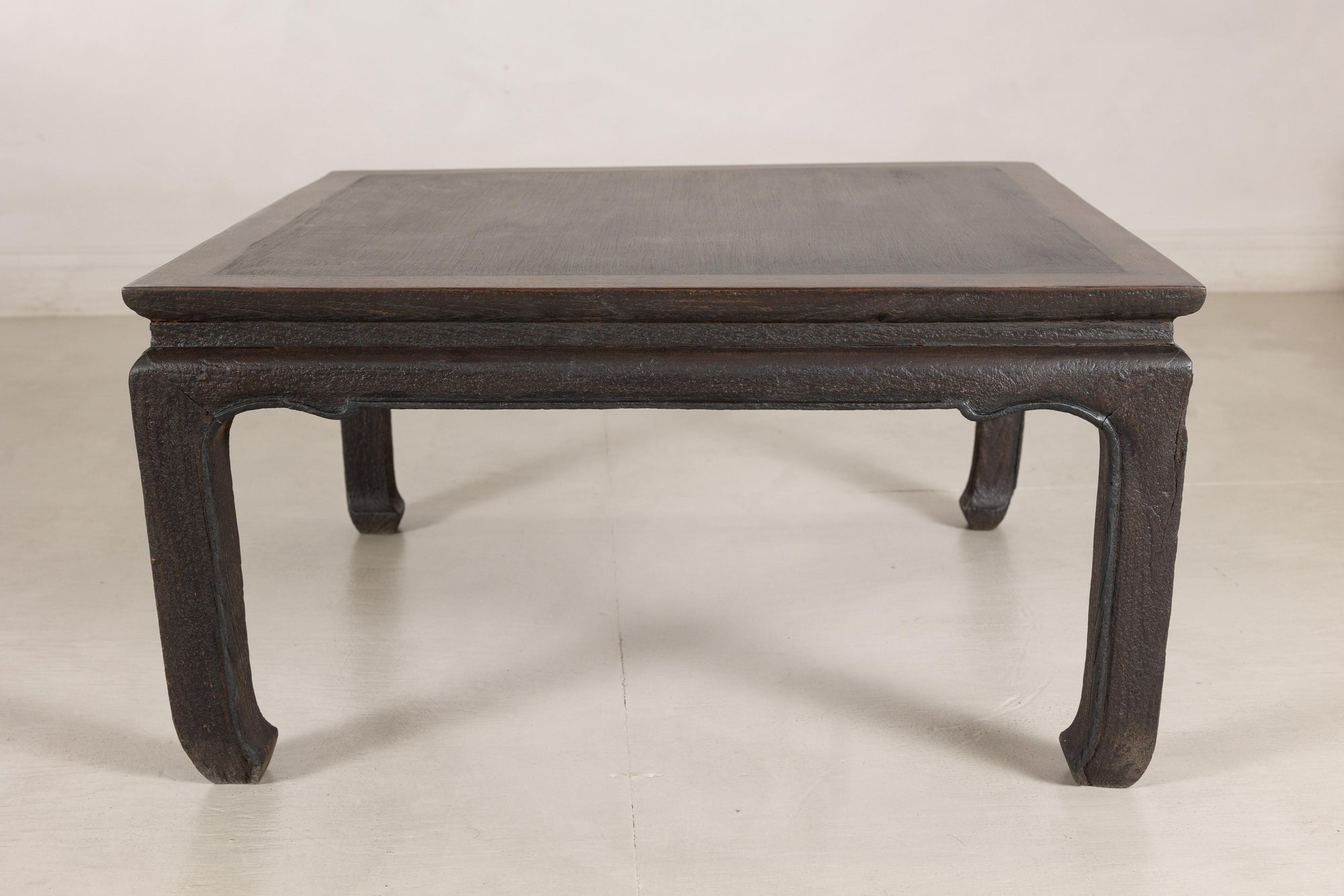 Chinese hardwood and dark stone coffee table interior view