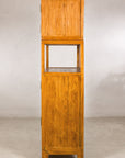 Left side profile of the tall Chinese cabinet