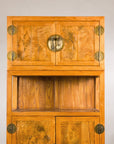 Upper cabinet and open shelf detail in warm elm wood