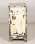 Left side view showing worn cream lacquer and exposed wood