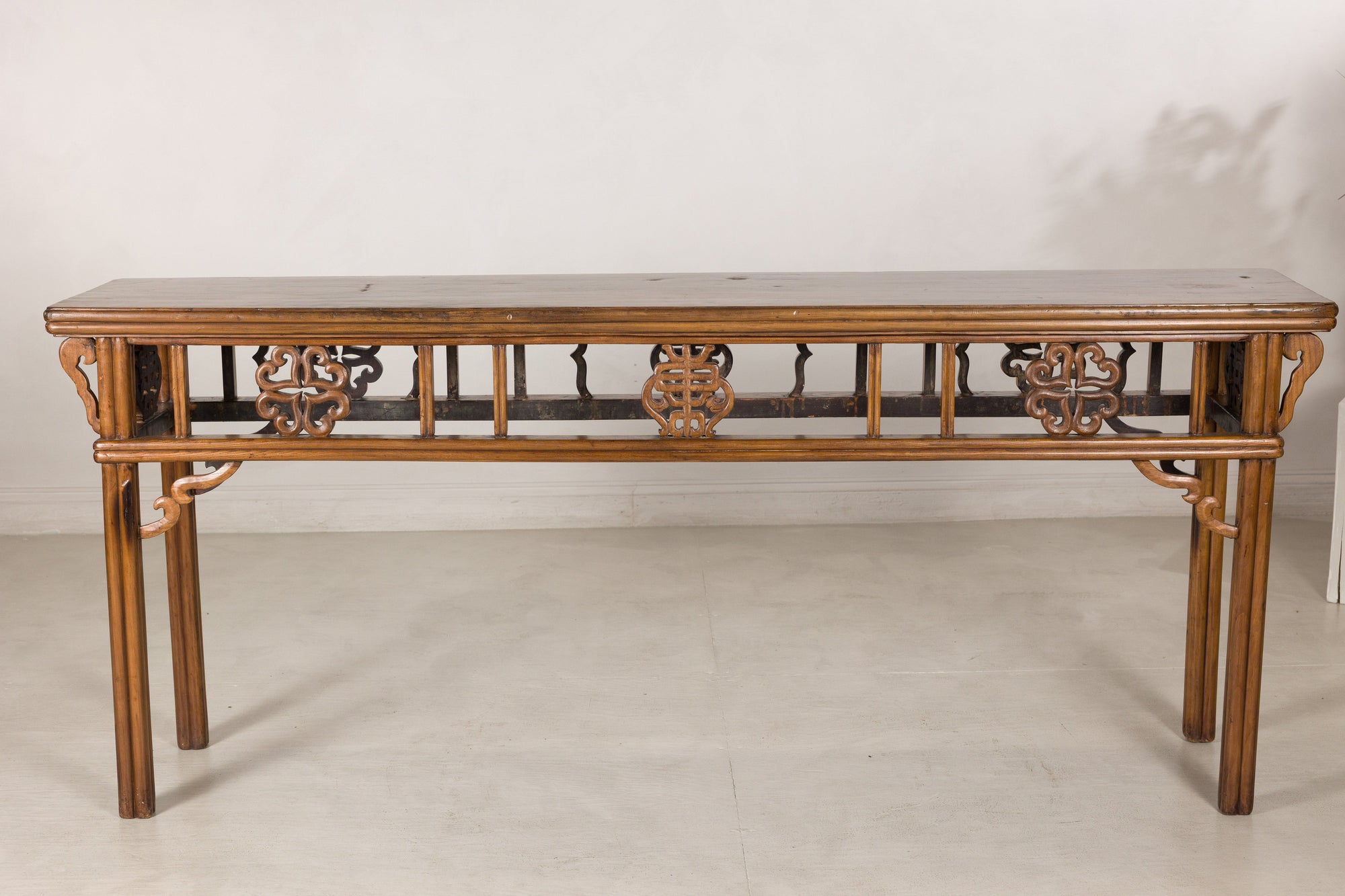 Alternate front view of the long console table and pierced apron